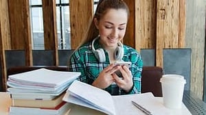 girl-young-student-sitting-table-books-notebook-pen-study-thumbnail